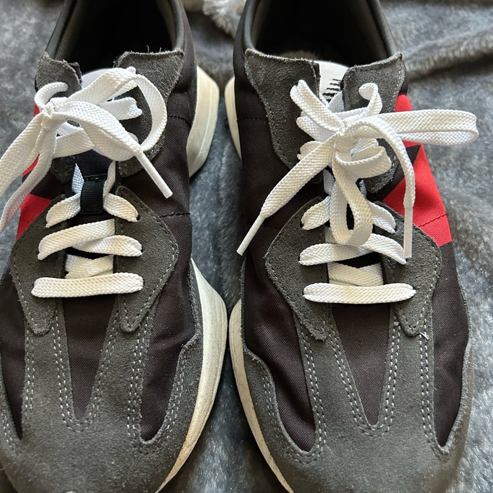 Men’s New Balance Black and Red Sneakers 9.5